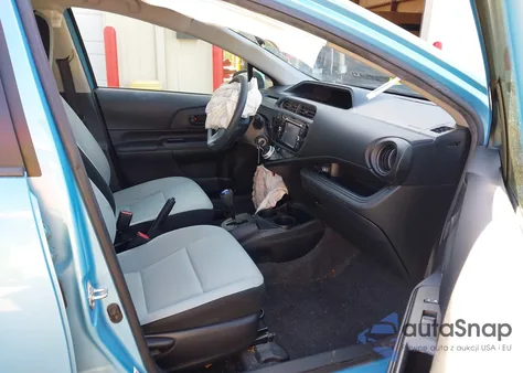 2015 Toyota Prius C One from USA, damaged, VIN JTDKDTB38F1097487
